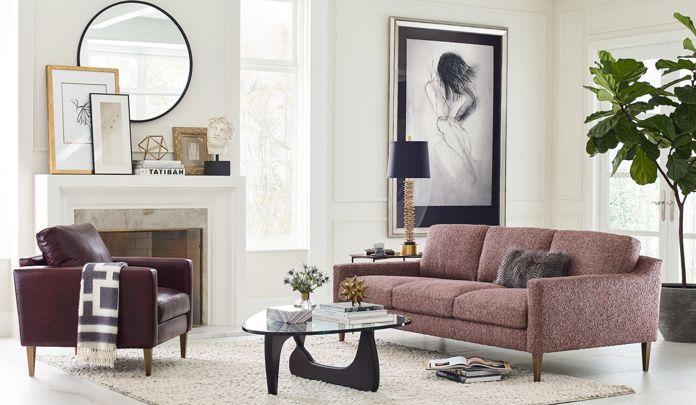 The  American Leather LSS Chair and Sofa sit in an elegant living room surrounded by decor from Penny Mustard