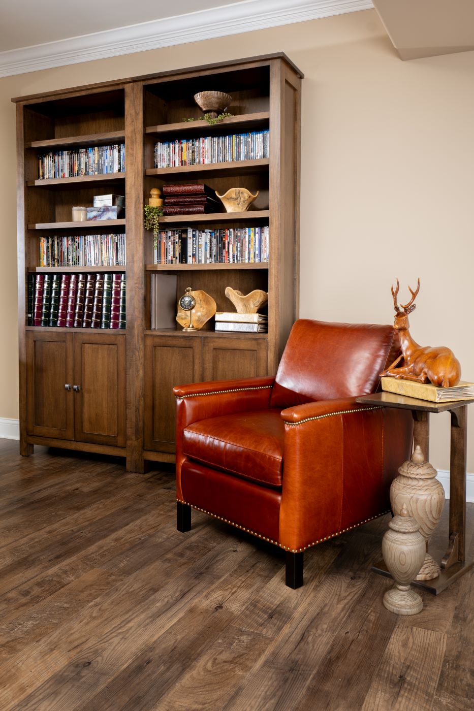 The Gould Chair and Sherwood Bookcases sit in a sparsely decorated office with decor from Penny Mustard