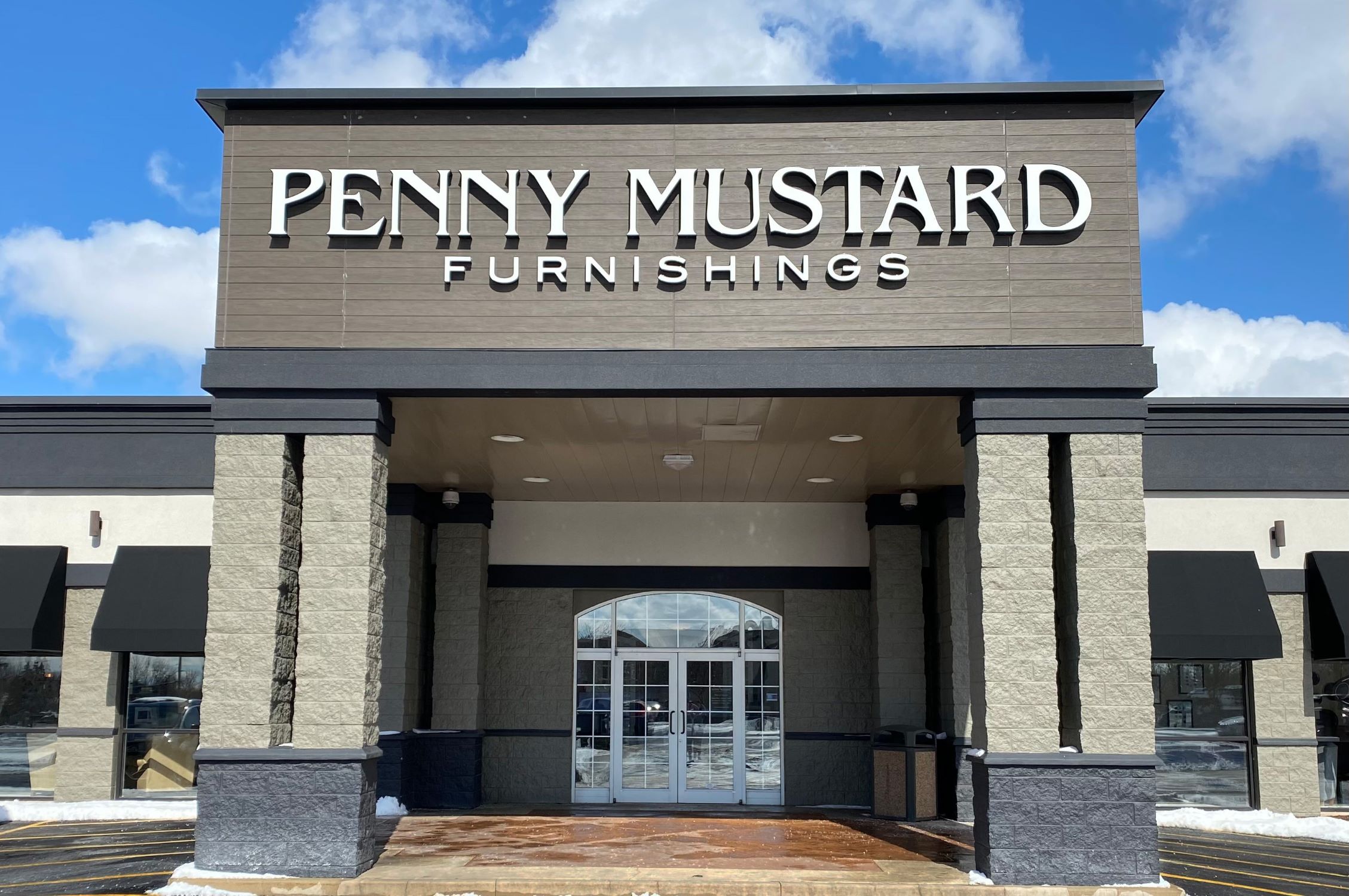 An exterior shot of the newest Penny Mustard Furnishings store